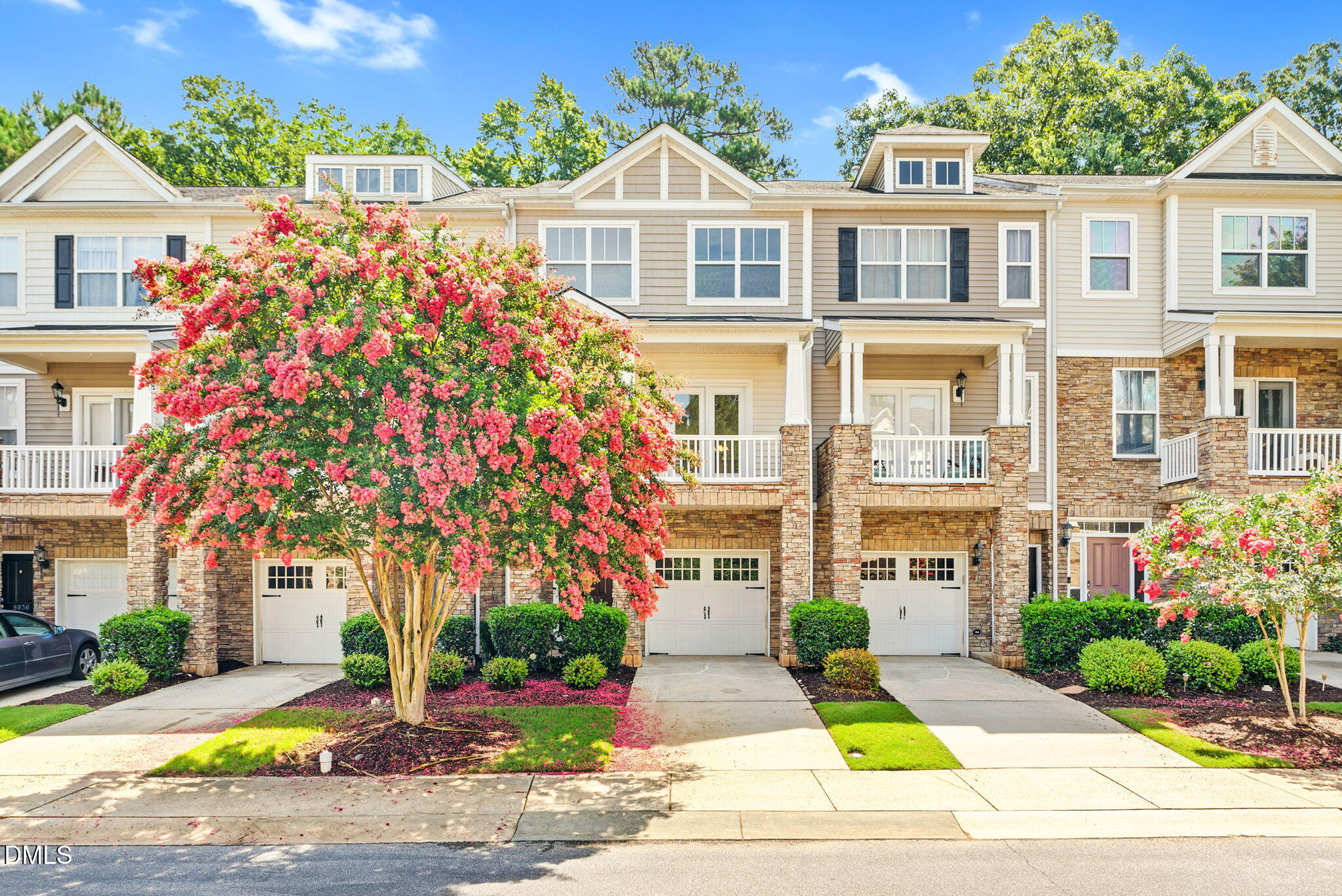 8032 Sycamore Hill Lane Raleigh, NC 27612 - Photo 2 of 59 a front view of a multi story residential apartment building