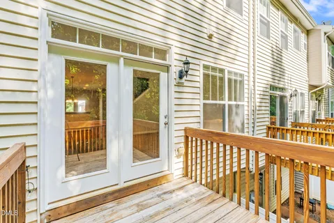 a bathroom with 2 sink and a mirror
