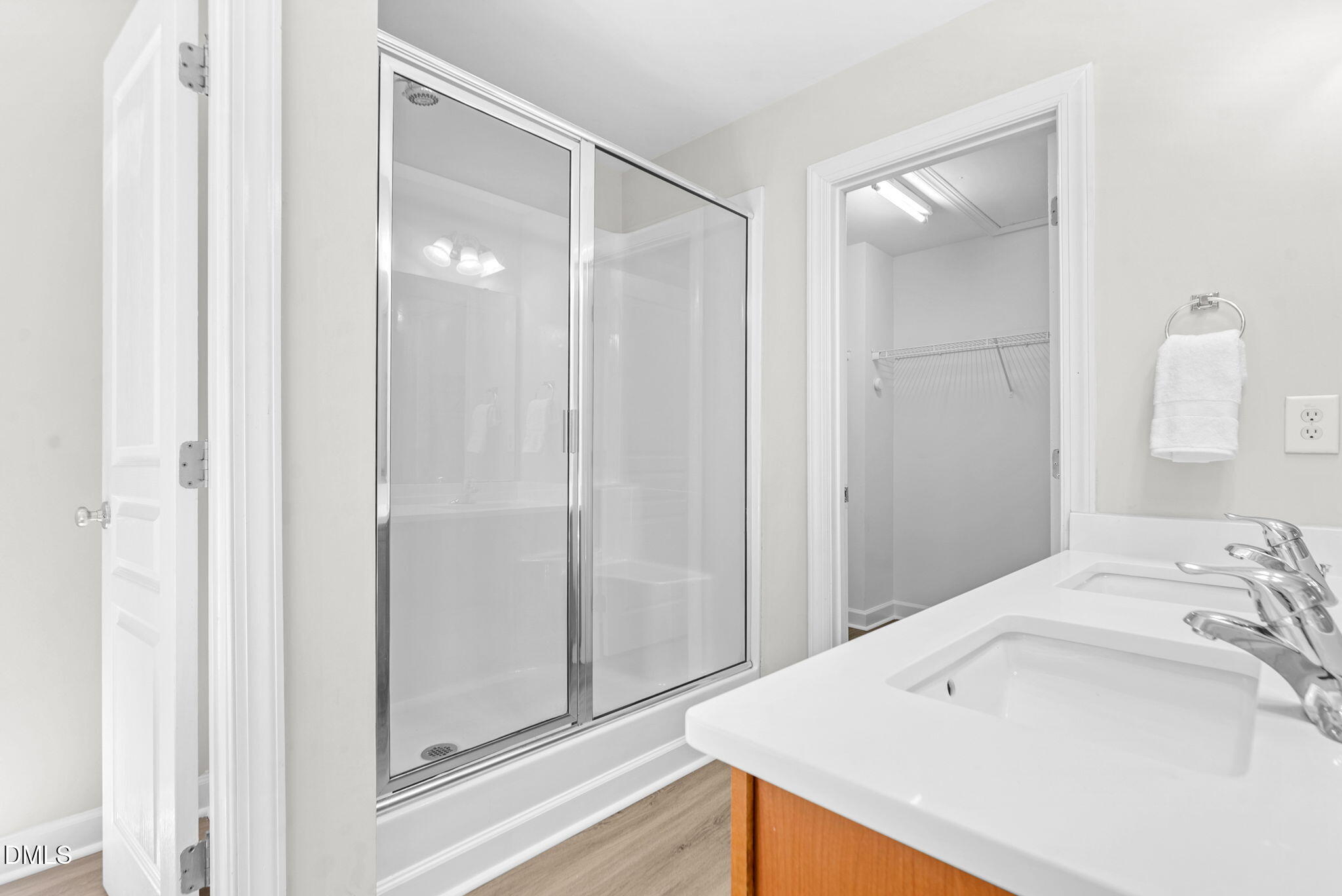 8032 Sycamore Hill Lane Raleigh, NC 27612 - Photo 47 of 59 a bathroom with a sink and a mirror