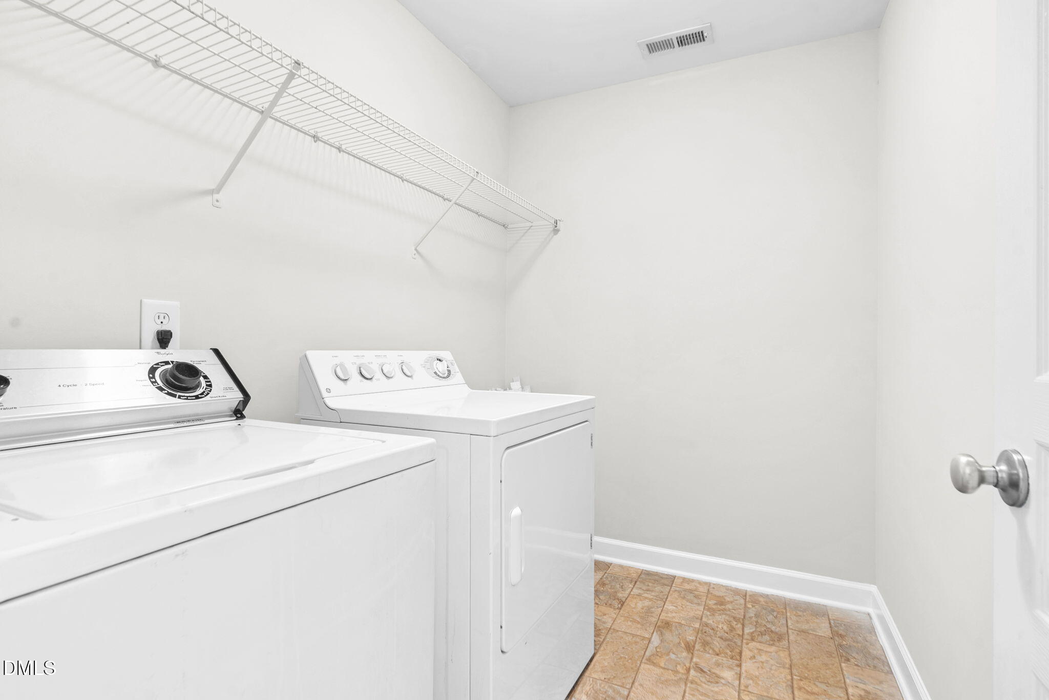 8032 Sycamore Hill Lane Raleigh, NC 27612 - Photo 56 of 59 a utility room with dryer and washer