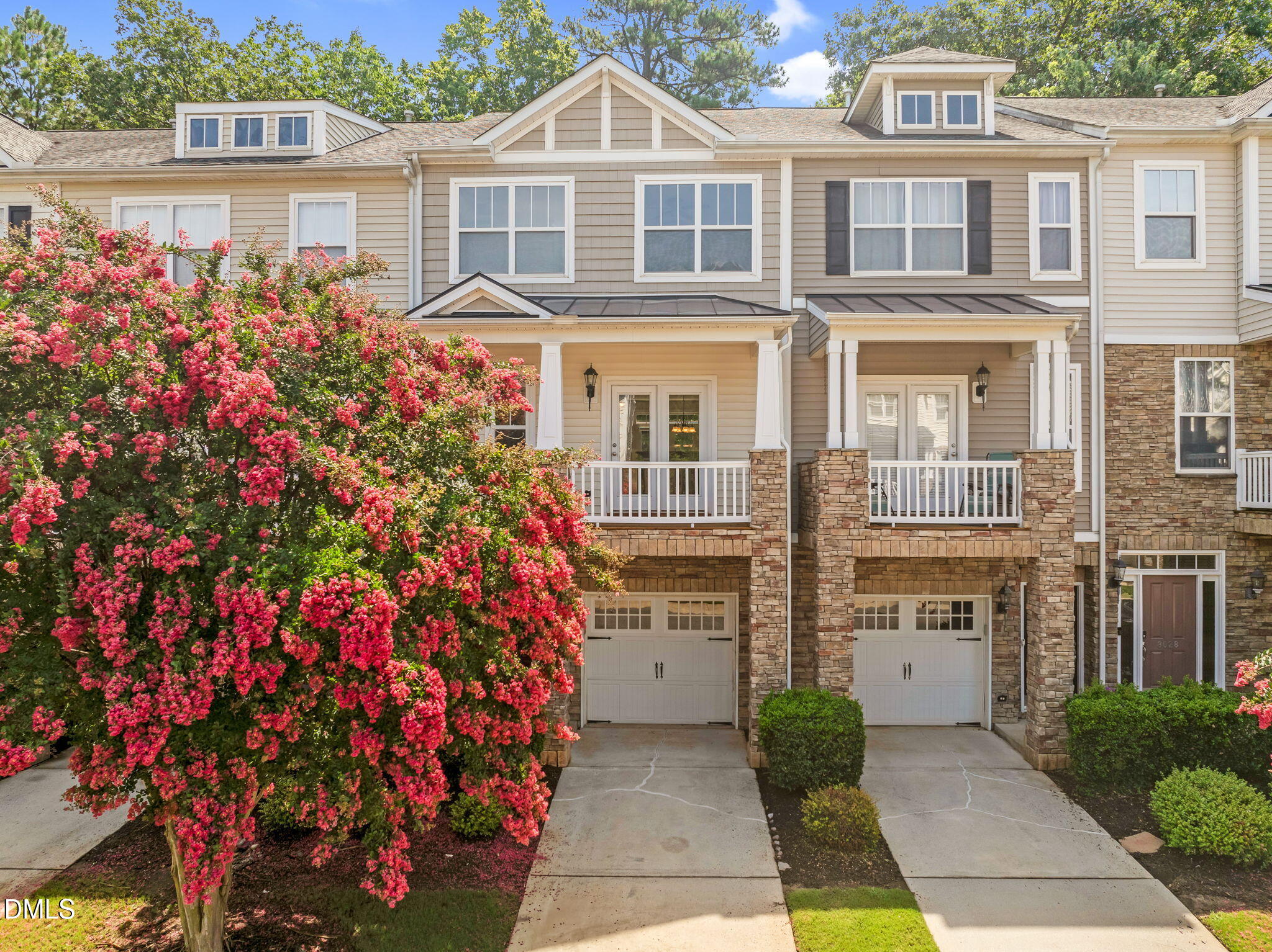 8032 Sycamore Hill Lane Raleigh, NC 27612 - Photo 58 of 59 a front view of a house with a garden