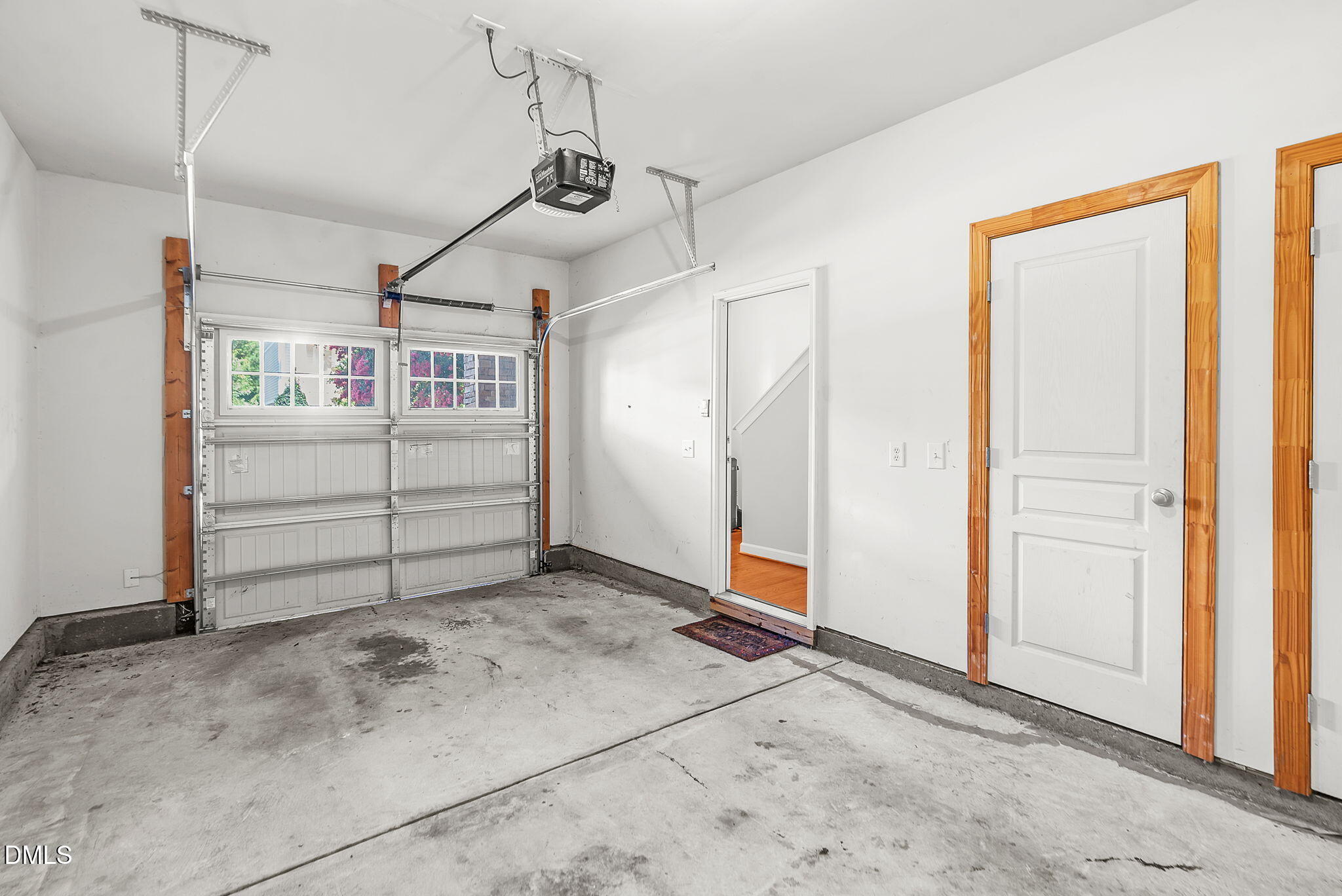 8032 Sycamore Hill Lane Raleigh, NC 27612 - Photo 6 of 59 a view of a garage