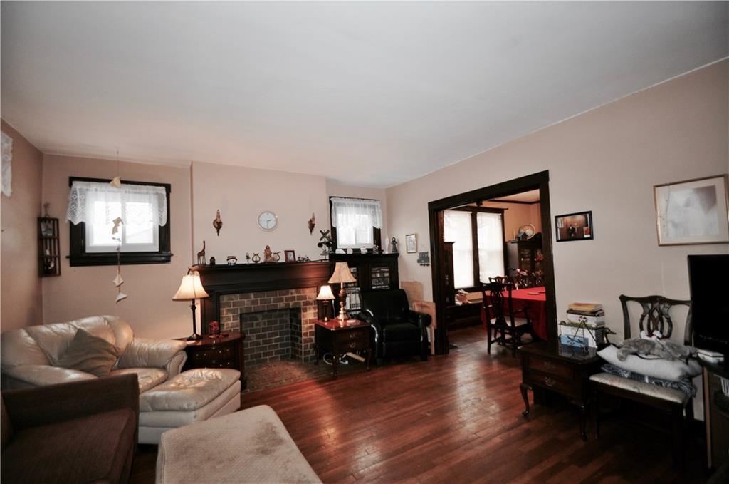 1301 Sharps Hill Road Pittsburgh, PA 15215 - Photo 2 of 23 Beautiful Living Room with Cozy fire place