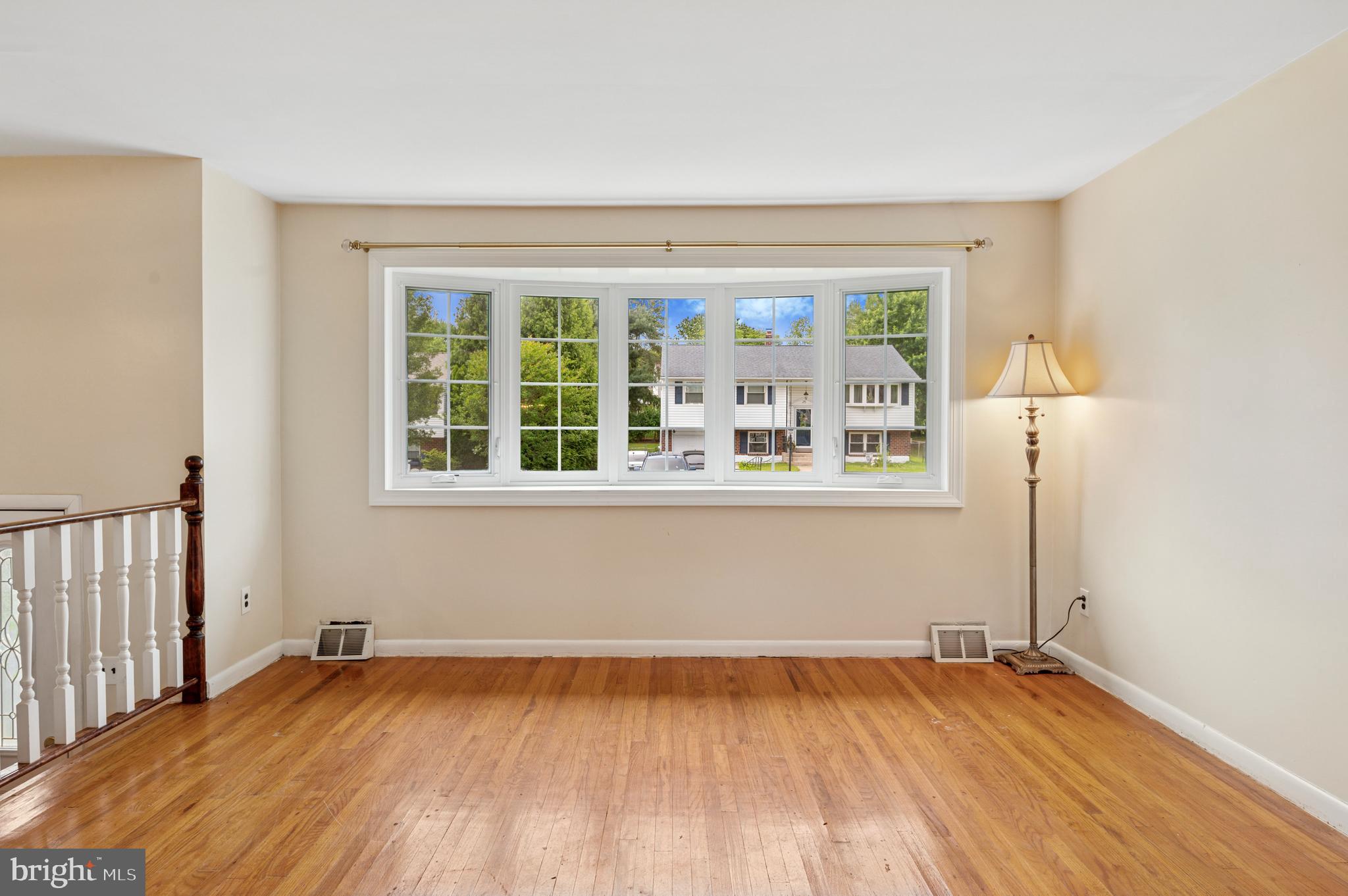 26 Anvil Road Aston, PA 19014 - Photo 8 of 30 a view of an empty room with wooden floor and a window