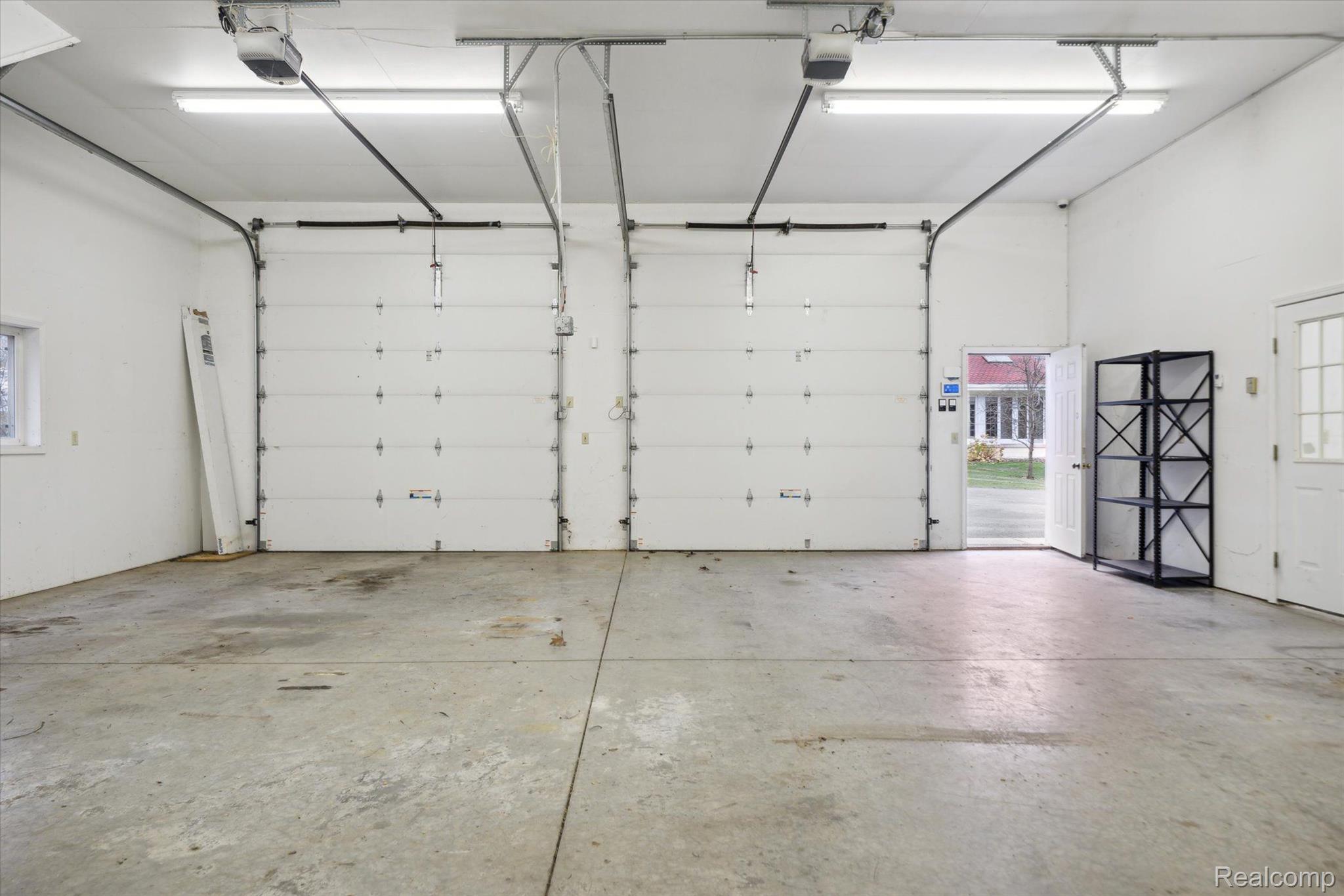 5240 Davis Road St. Clair, MI 48079 - Photo 57 of 69 The garage doors are each 9 ft. tall