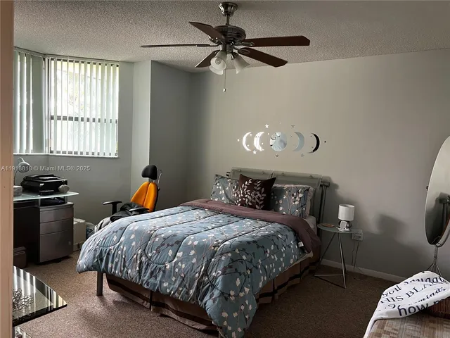 a bathroom with a sink a mirror and a bathtub