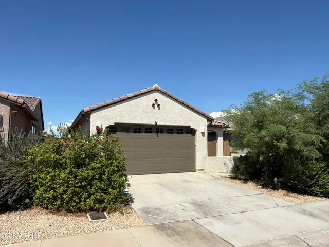a house with trees in the background