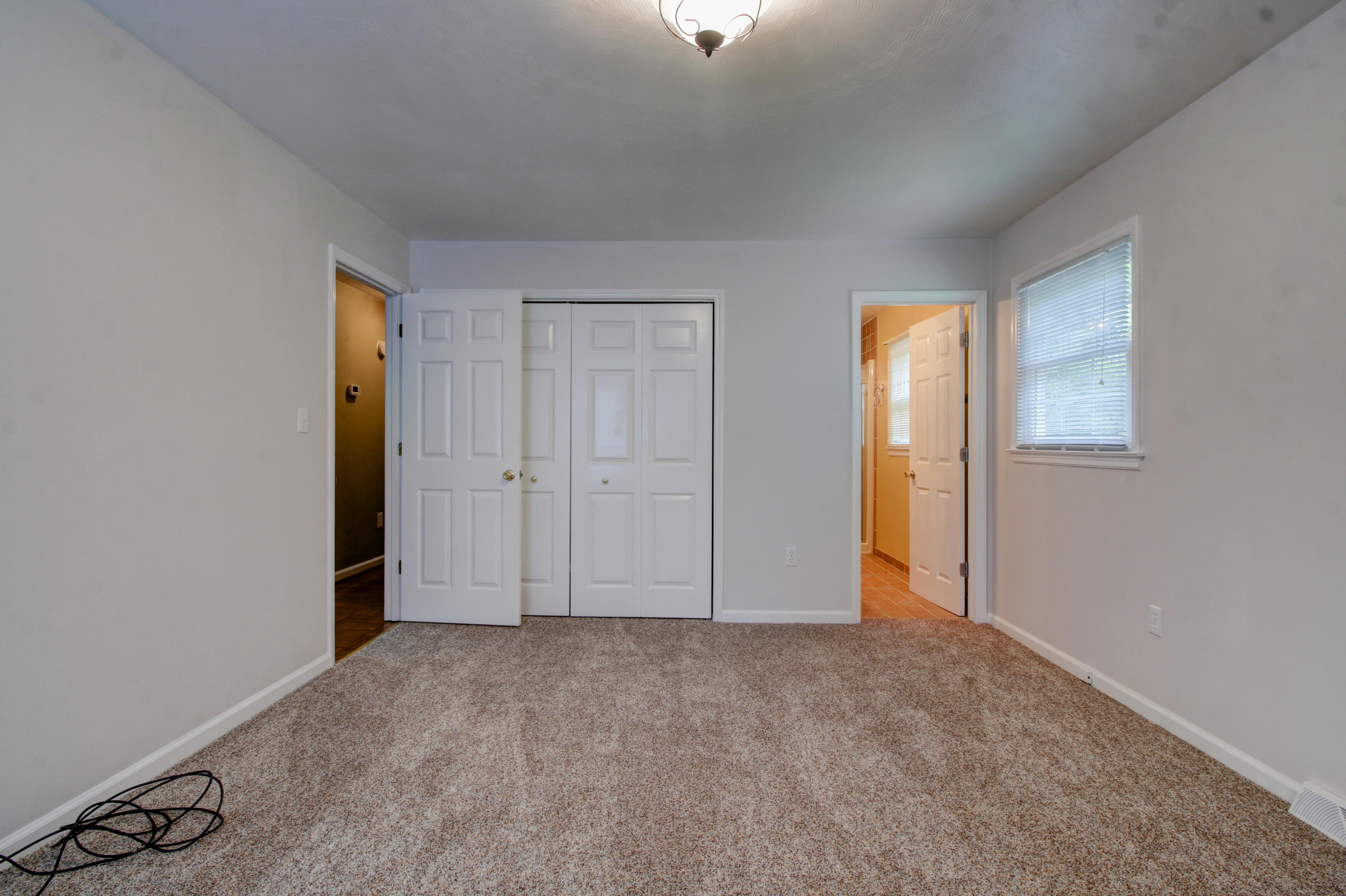 1396 Mountain Pass Road Blue Ridge, VA 24064 - Photo 14 of 28 a view of an empty room and closet area
