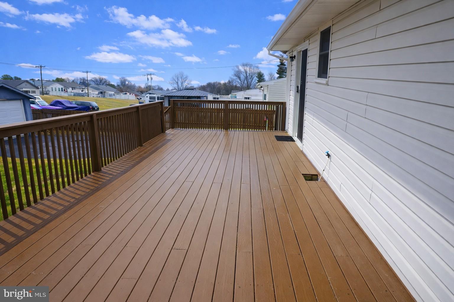 103 Tuscany Road Aston, PA 19014 - Photo 11 of 11 Spacious deck with scenic outdoor views.