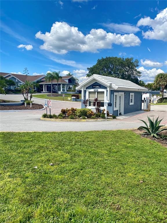 234 Mango Drive, Unit B Davenport, FL 33897 - Photo 8 of 17 a front view of a house with garden
