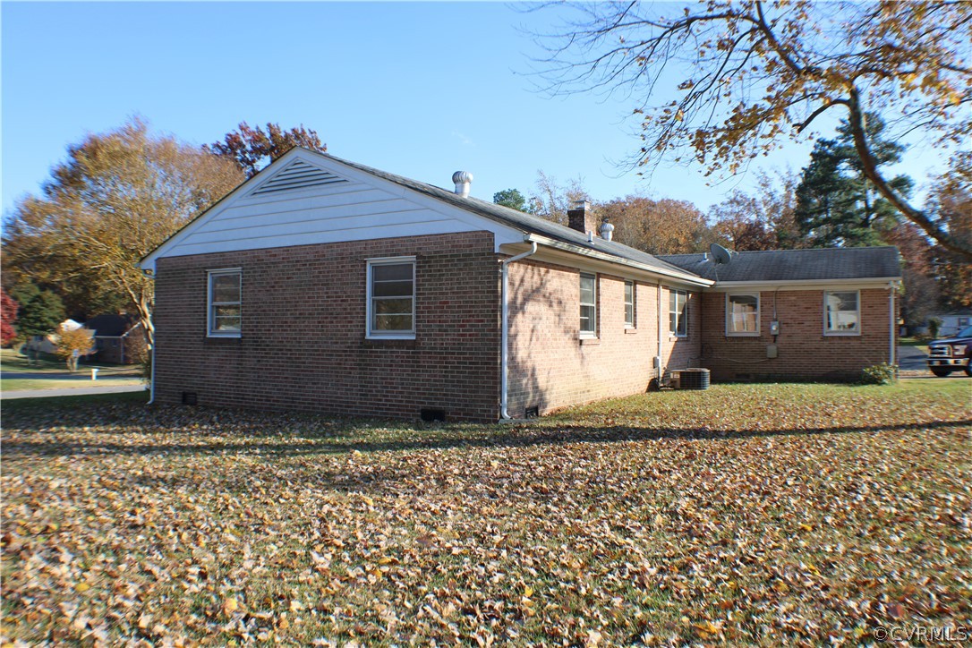 8132 Concho Road North Chesterfield, VA 23237 - Photo 28 of 32 a view of a house with a yard