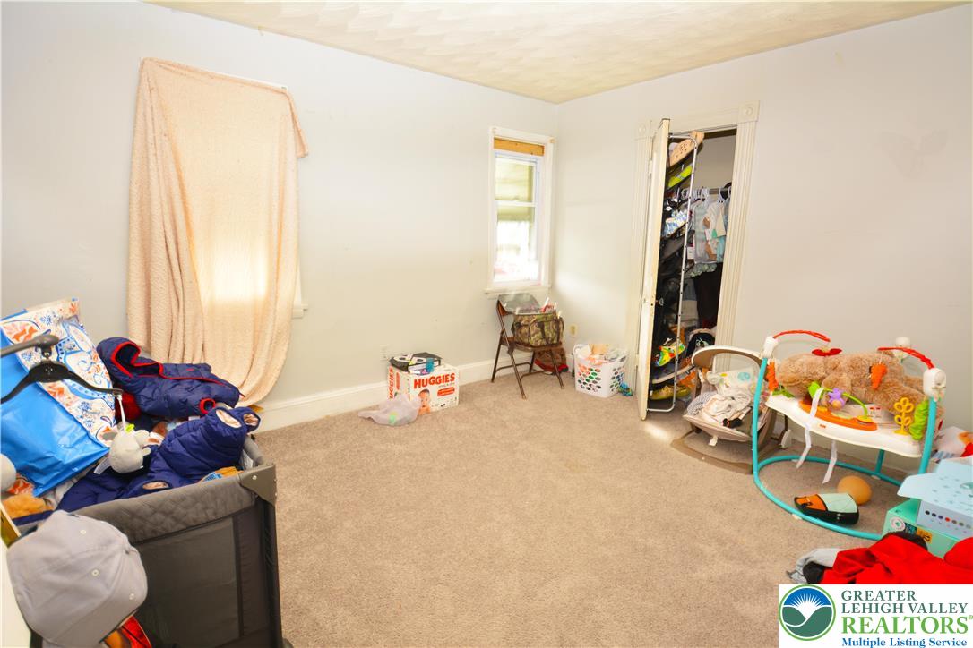 416 East Washington Street Nanticoke, PA 18634 - Photo 5 of 9 a living room with furniture and a window