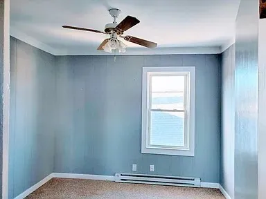 a view of a livingroom with a window