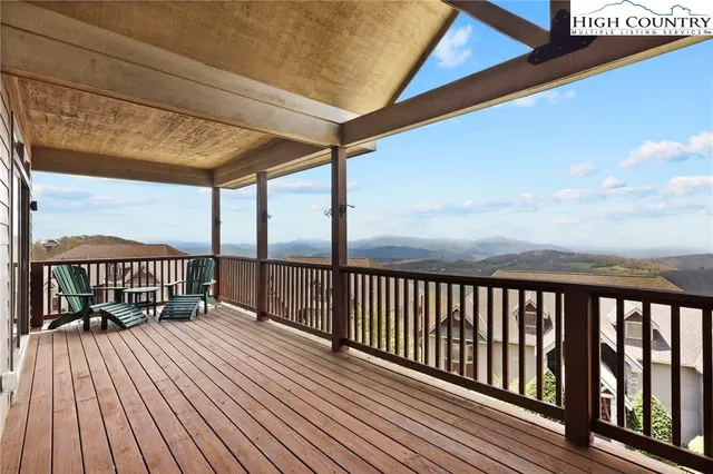 a view of balcony with wooden floor