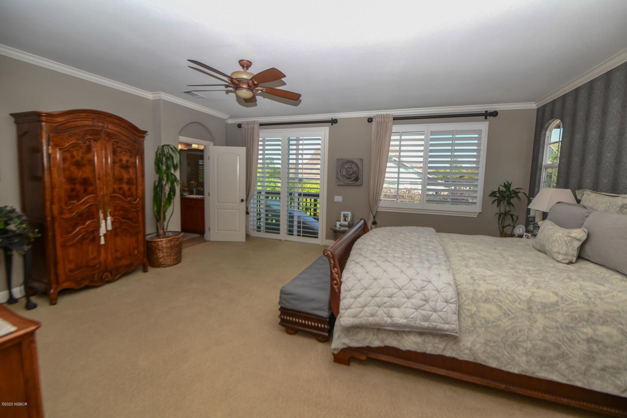 730 Onstott Road Lompoc, CA 93436 - Photo 46 of 103 a bed sitting in a spacious bedroom next to a window