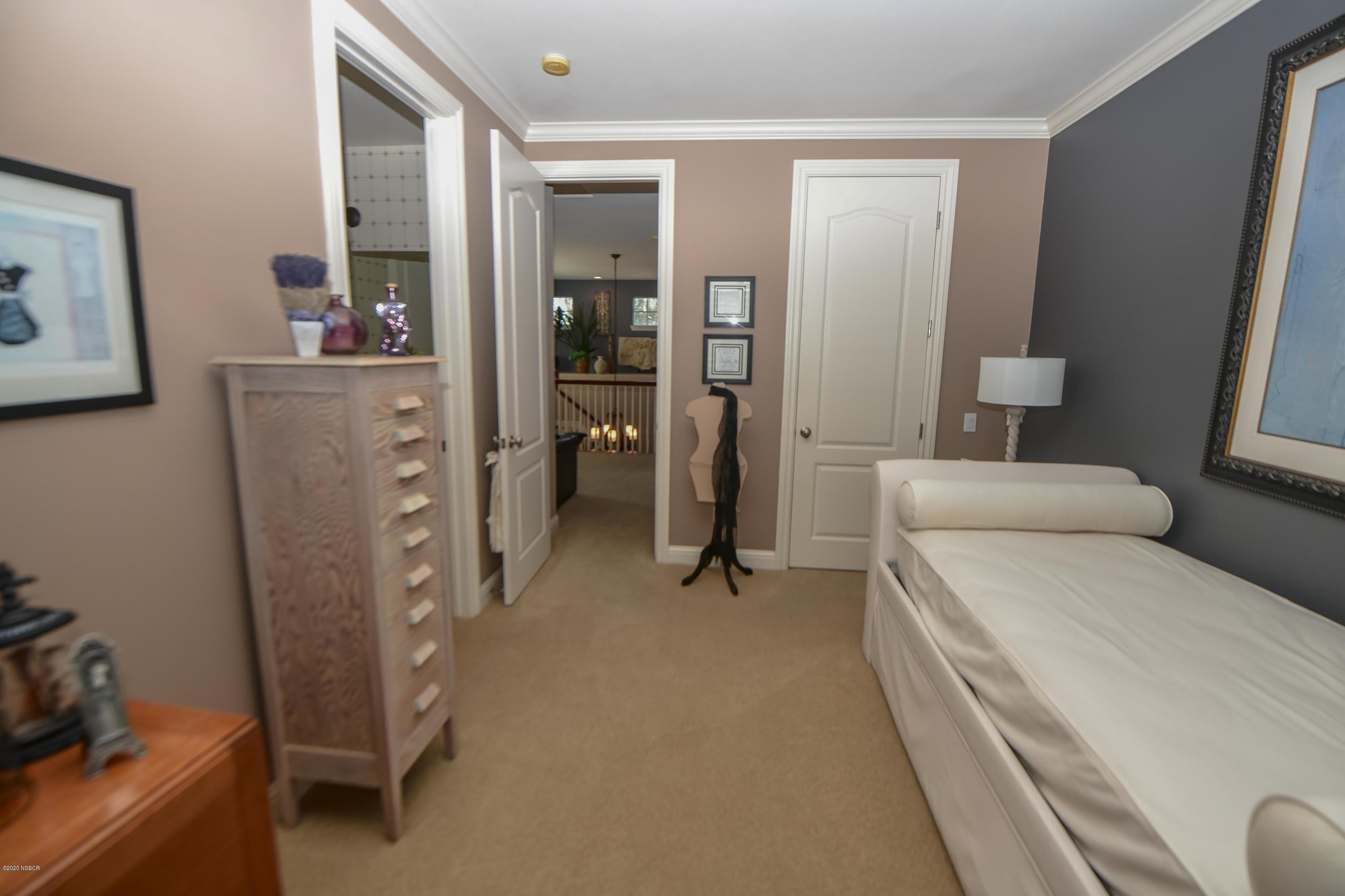 730 Onstott Road Lompoc, CA 93436 - Photo 51 of 103 a room with a bed and a mirror