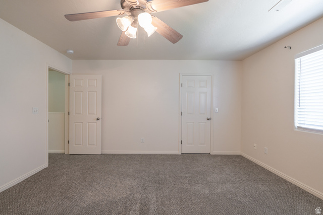 1735 West 540 North, Unit 1805 St. George, UT 84770 - Photo 48 of 64 Spacious room featuring neutral carpeting, light-toned walls, and a ceiling fan with integrated lighting