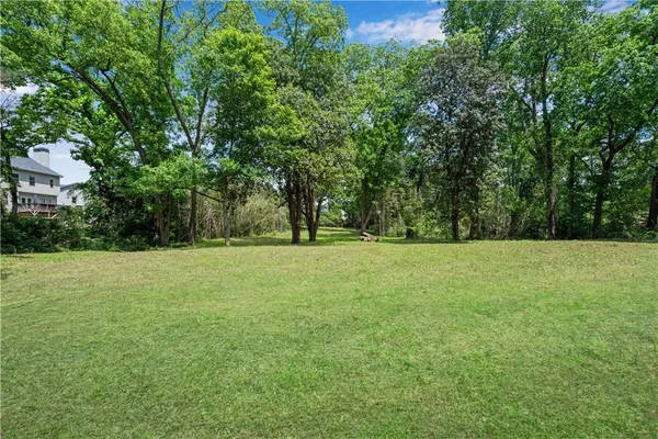 a view of field with trees