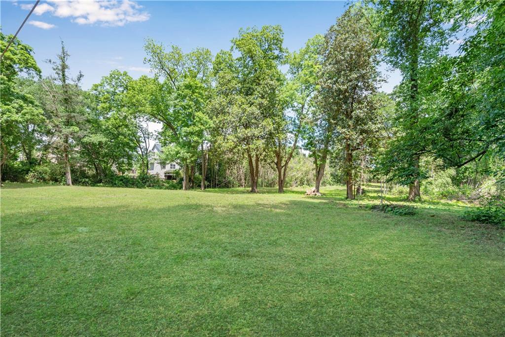5387 Austell Powder Springs Road Southwest Austell, GA 30106 - Photo 7 of 11 a view of field with trees