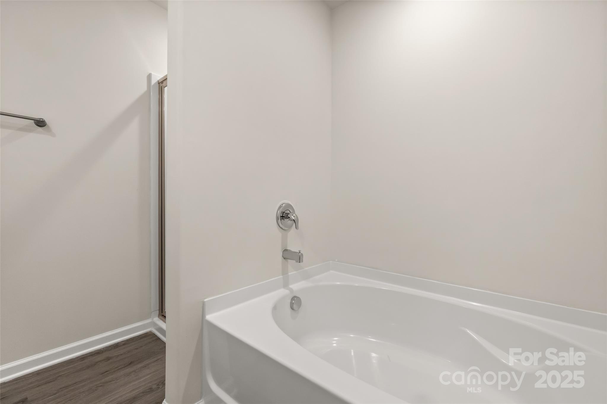 314 South French Street Lancaster, SC 29720 - Photo 18 of 39 a white bath tub sitting in a bathroom