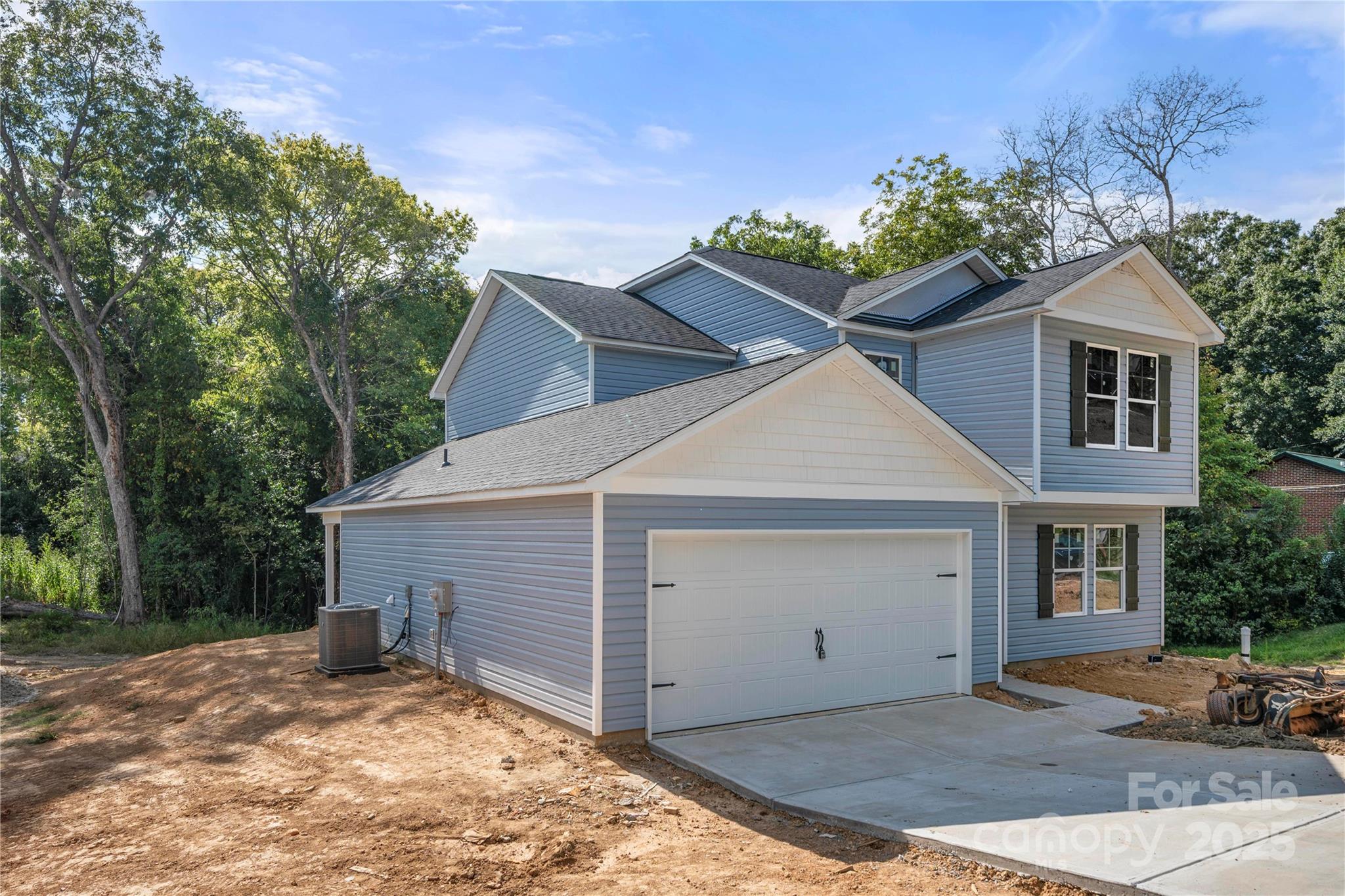 314 South French Street Lancaster, SC 29720 - Photo 3 of 39 a view of a house with a yard and potted plants
