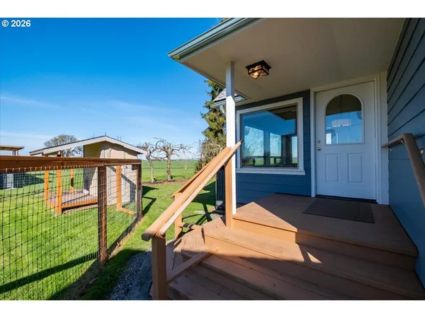 a view of an chairs in the balcony
