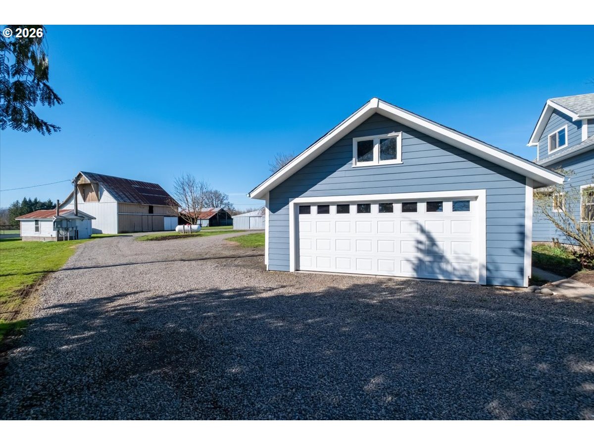27144 Irish Bend Loop Halsey, OR 97348 - Photo 28 of 48 a front view of a house with a yard