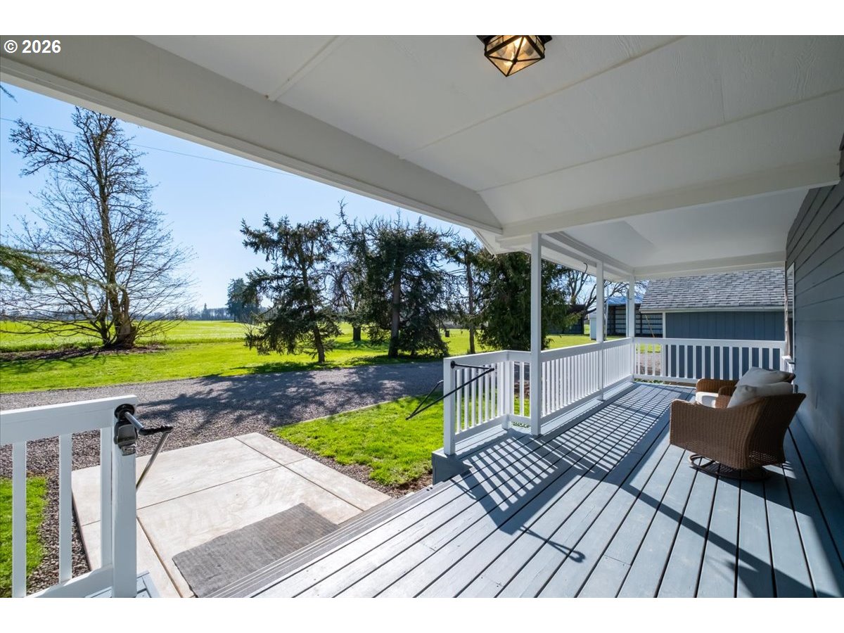 27144 Irish Bend Loop Halsey, OR 97348 - Photo 3 of 48 a view of a swimming pool with a patio