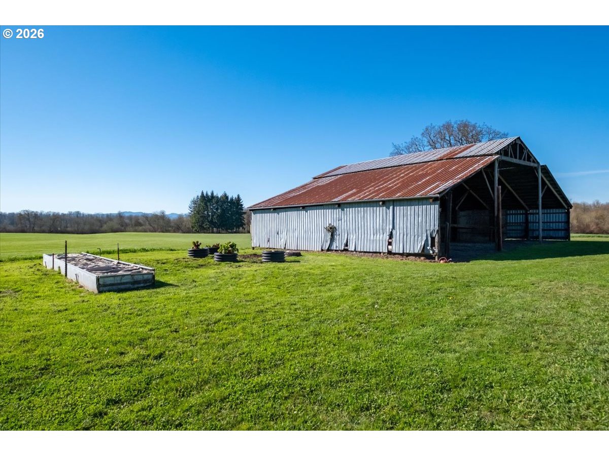 27144 Irish Bend Loop Halsey, OR 97348 - Photo 37 of 48 a view of a house with a yard
