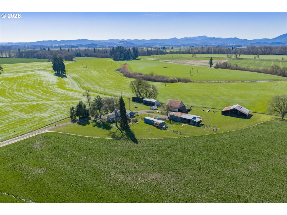 27144 Irish Bend Loop Halsey, OR 97348 - Photo 44 of 48 a backyard of a house with lots of green space