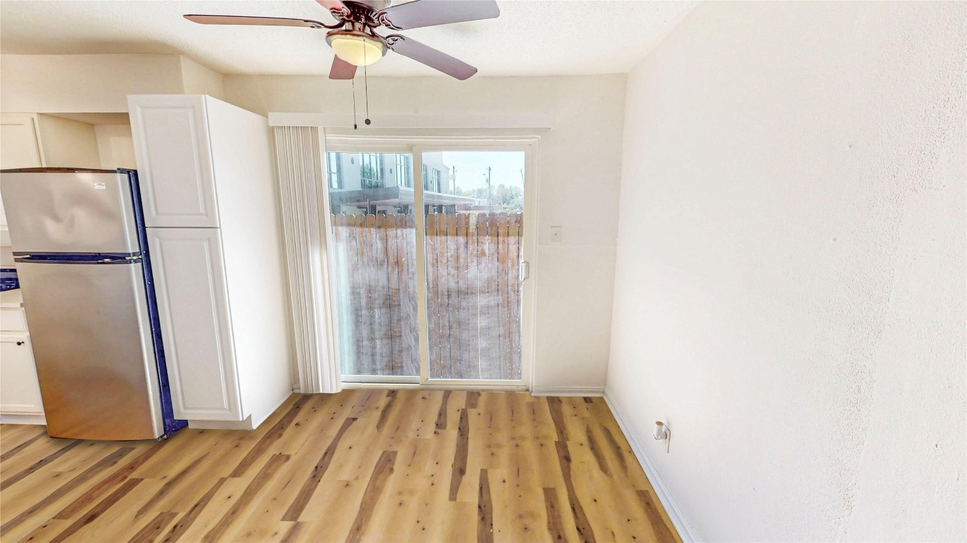 2707 Windswept Cove, Unit 102 Austin, TX 78745 - Photo 4 of 12 a view of a livingroom with a fireplace