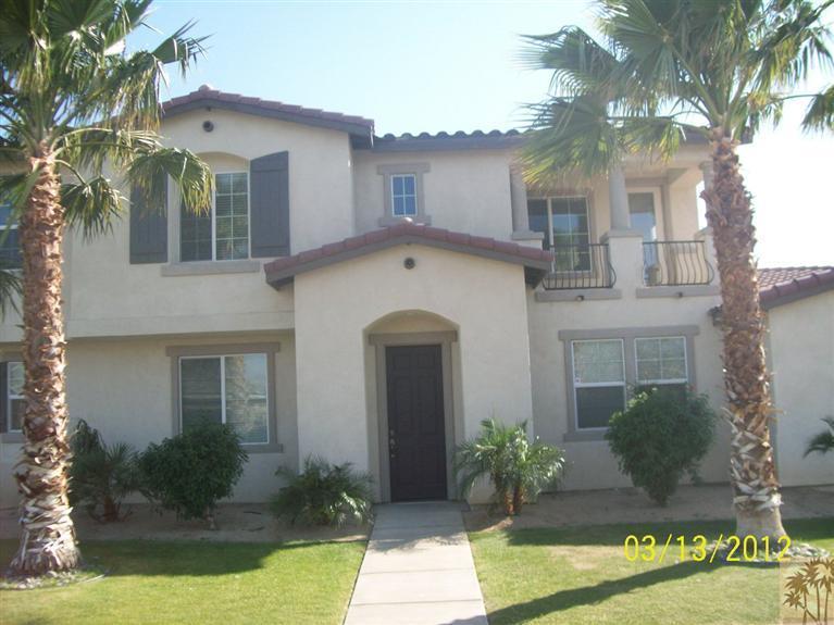 83401 Lone Star Road Indio, CA 92203 - Photo 1 of 10 a front view of a house with garden