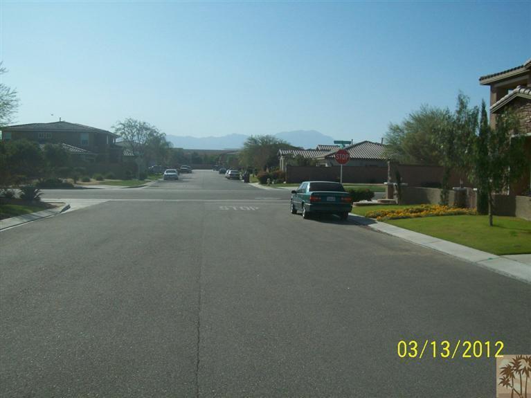 83401 Lone Star Road Indio, CA 92203 - Photo 3 of 10 a view of road with grass and trees
