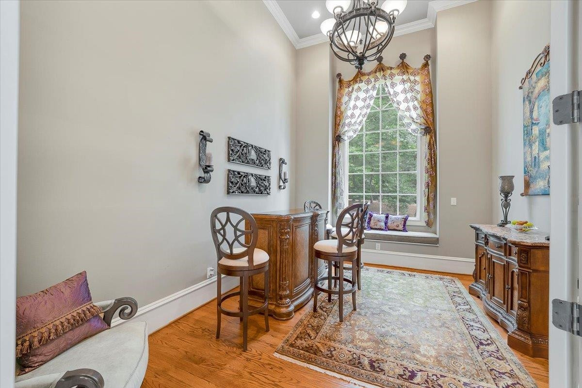 9712 Honeycutt Road Raleigh, NC 27614 - Photo 30 of 83 Mezzanine Room Currently Set up as Wine Tasting Room Office/Study-Mezzanine Level