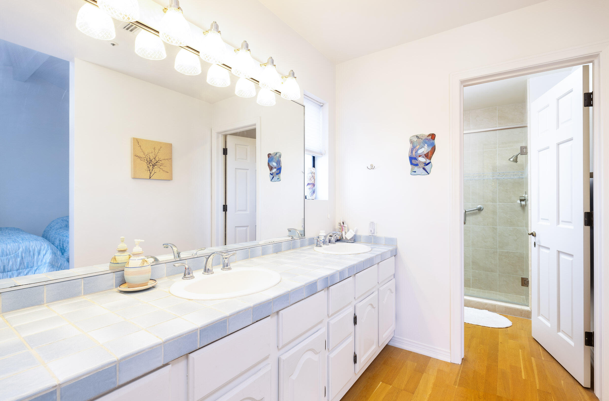 4925 Sandyland Road, Unit F Carpinteria, CA 93013 - Photo 17 of 19 a bathroom with a tub sink and mirror