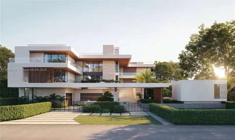 a front view of a house with a yard table and chairs