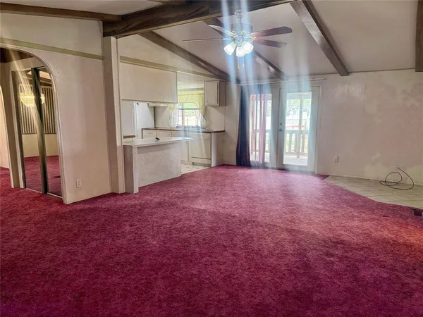 a view of a livingroom with furniture