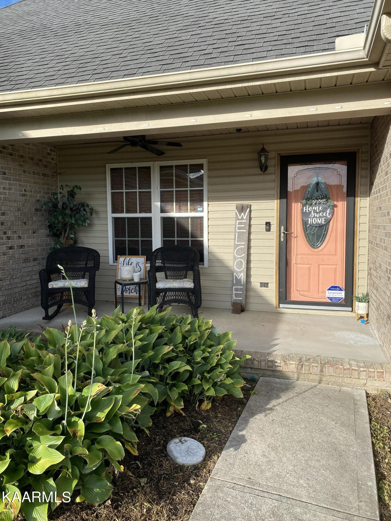 114 Walnut Lane Corryton, TN 37721 - Photo 5 of 38 a front view of house with outdoor seating