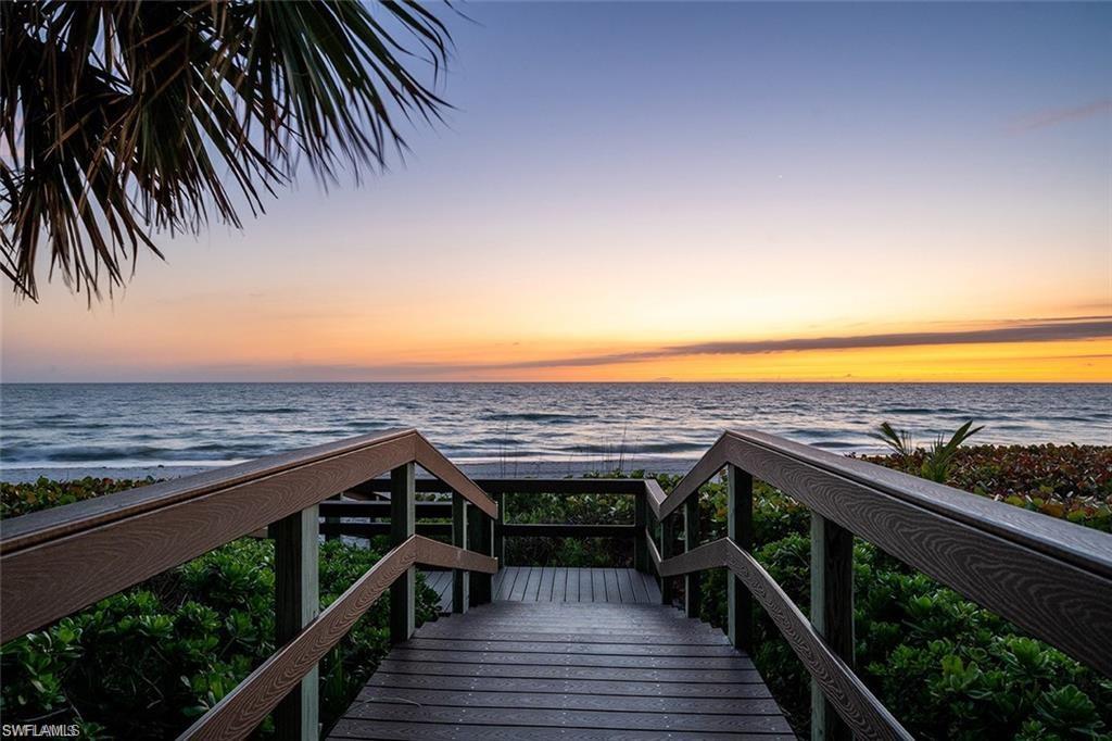 4856 Crayton Road Naples, FL 34103 - Photo 21 of 24 a view of a terrace with outdoor seating and deck