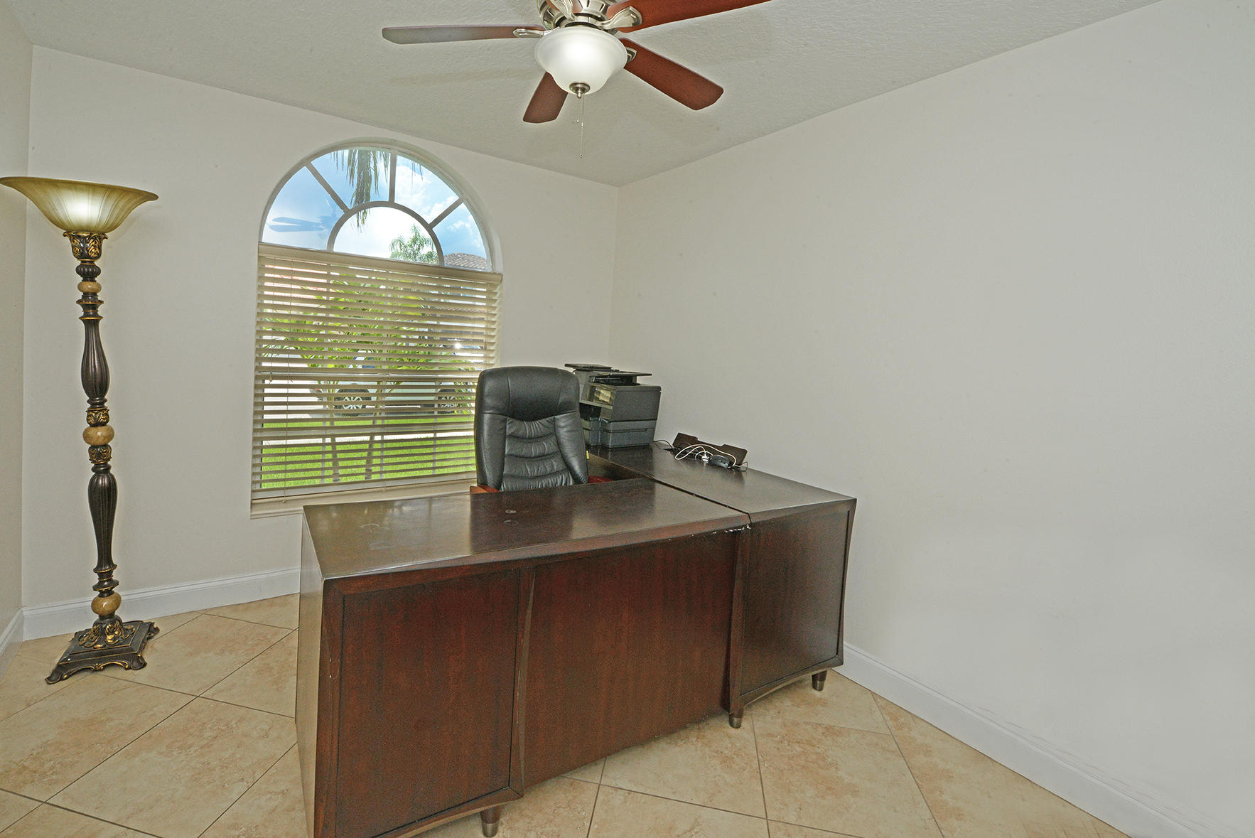 9513 Lake Serena Drive Boca Raton, FL 33496 - Photo 20 of 26 a view of a livingroom with furniture and window