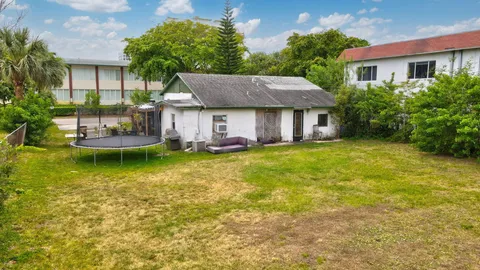 a view of a house with a big yard