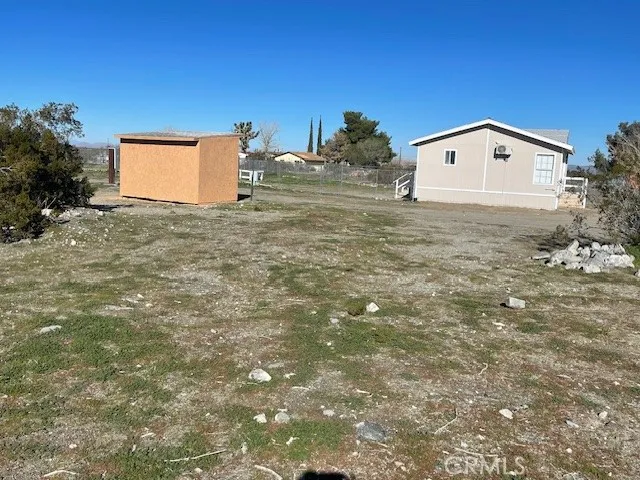a view of a big room with wooden floor
