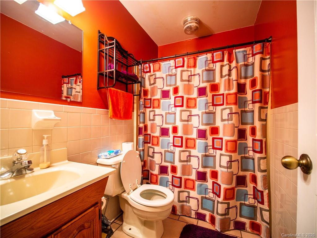 5610 Camp Creek Road Lancaster, SC 29720 - Photo 13 of 21 a bathroom with a sink toilet and shower