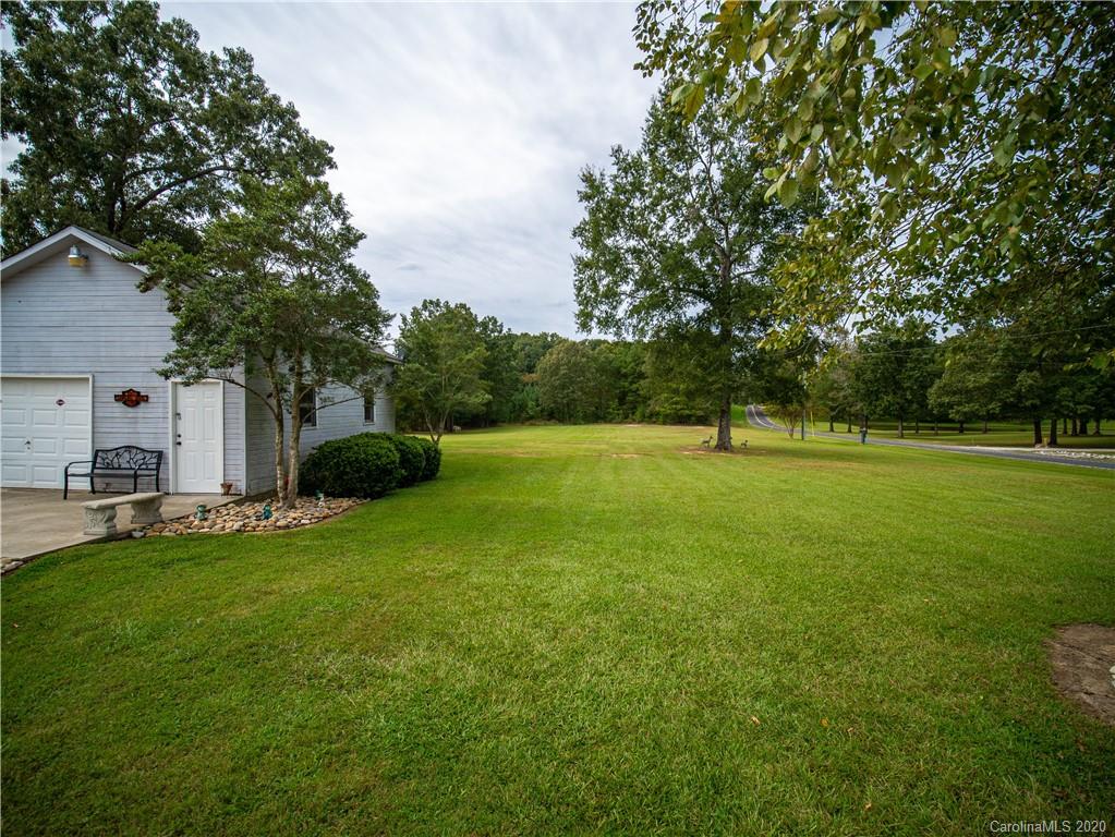 5610 Camp Creek Road Lancaster, SC 29720 - Photo 21 of 21 a view of a house with a big yard