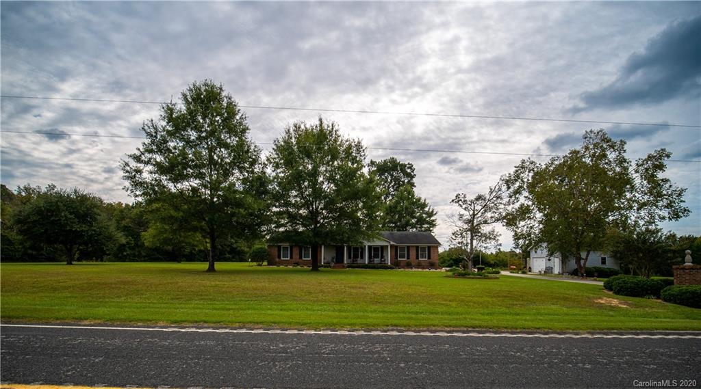 5610 Camp Creek Road Lancaster, SC 29720 - Photo 4 of 21 a front view of a house with a yard