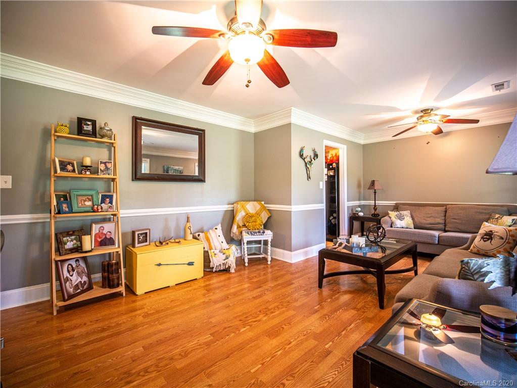 5610 Camp Creek Road Lancaster, SC 29720 - Photo 10 of 21 a living room with furniture and a flat screen tv