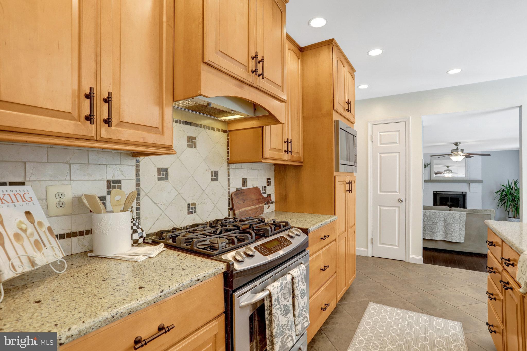 7206 Joshua Tree Lane Springfield, VA 22152 - Photo 11 of 50 Warm and inviting kitchen with modern charm.