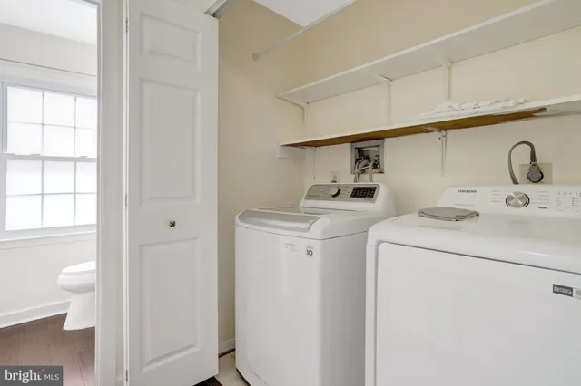 a utility room with dryer and washer