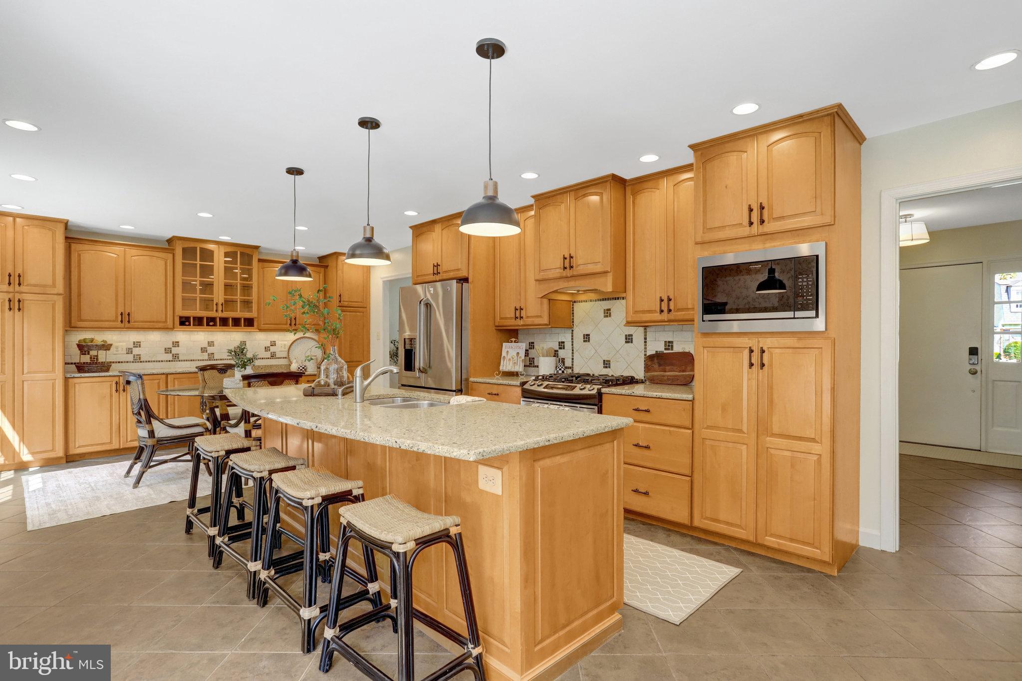 7206 Joshua Tree Lane Springfield, VA 22152 - Photo 2 of 50 Warm and inviting modern kitchen space.