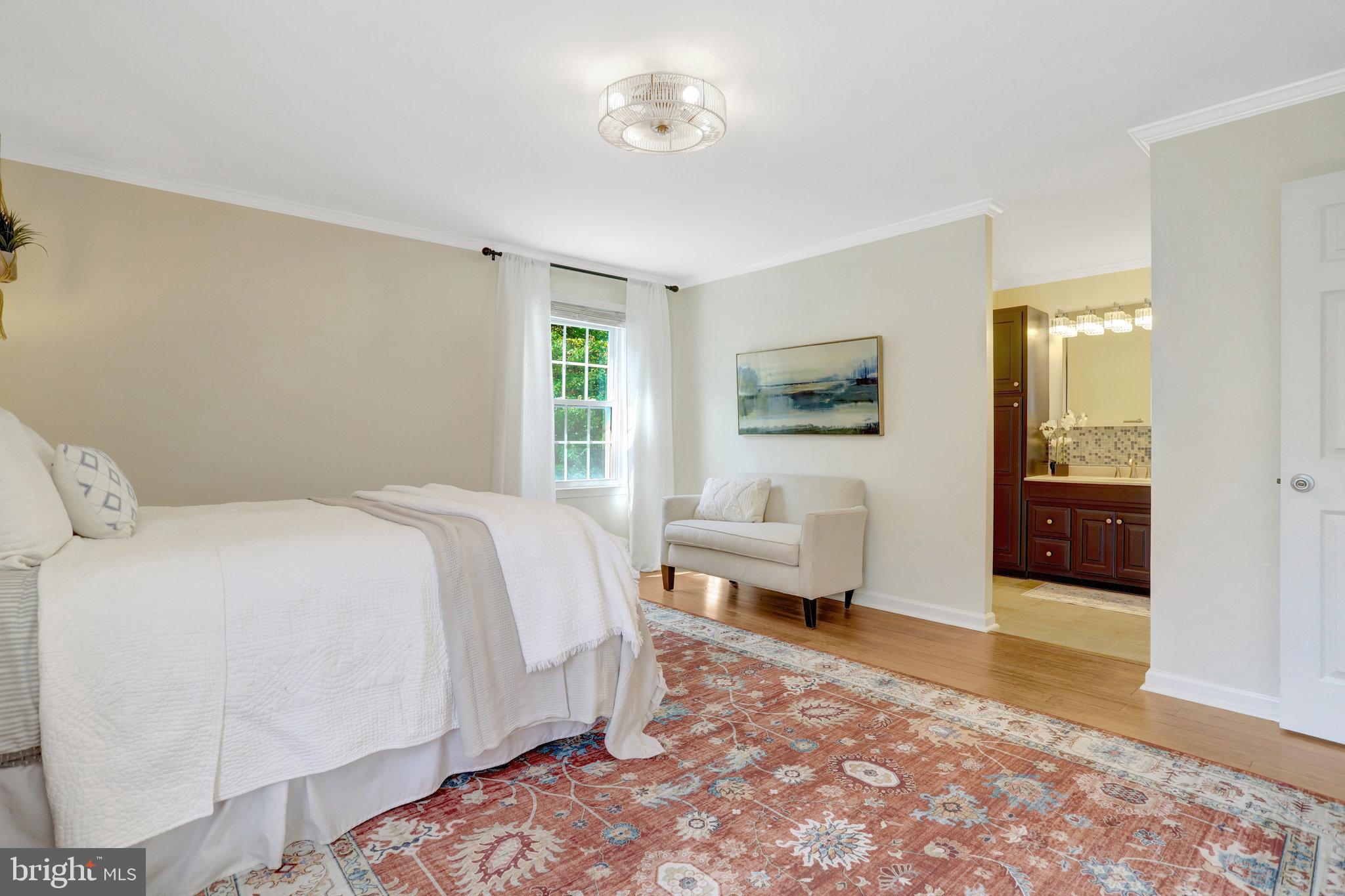 7206 Joshua Tree Lane Springfield, VA 22152 - Photo 21 of 50 Serene bedroom with natural light and charm.